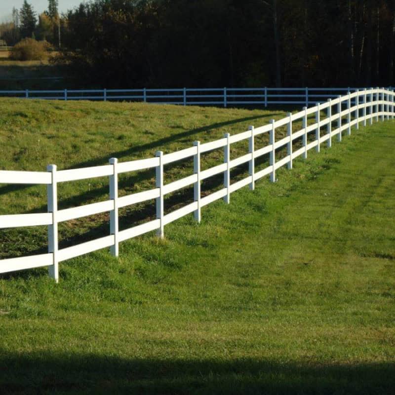 white fence rolling slopes